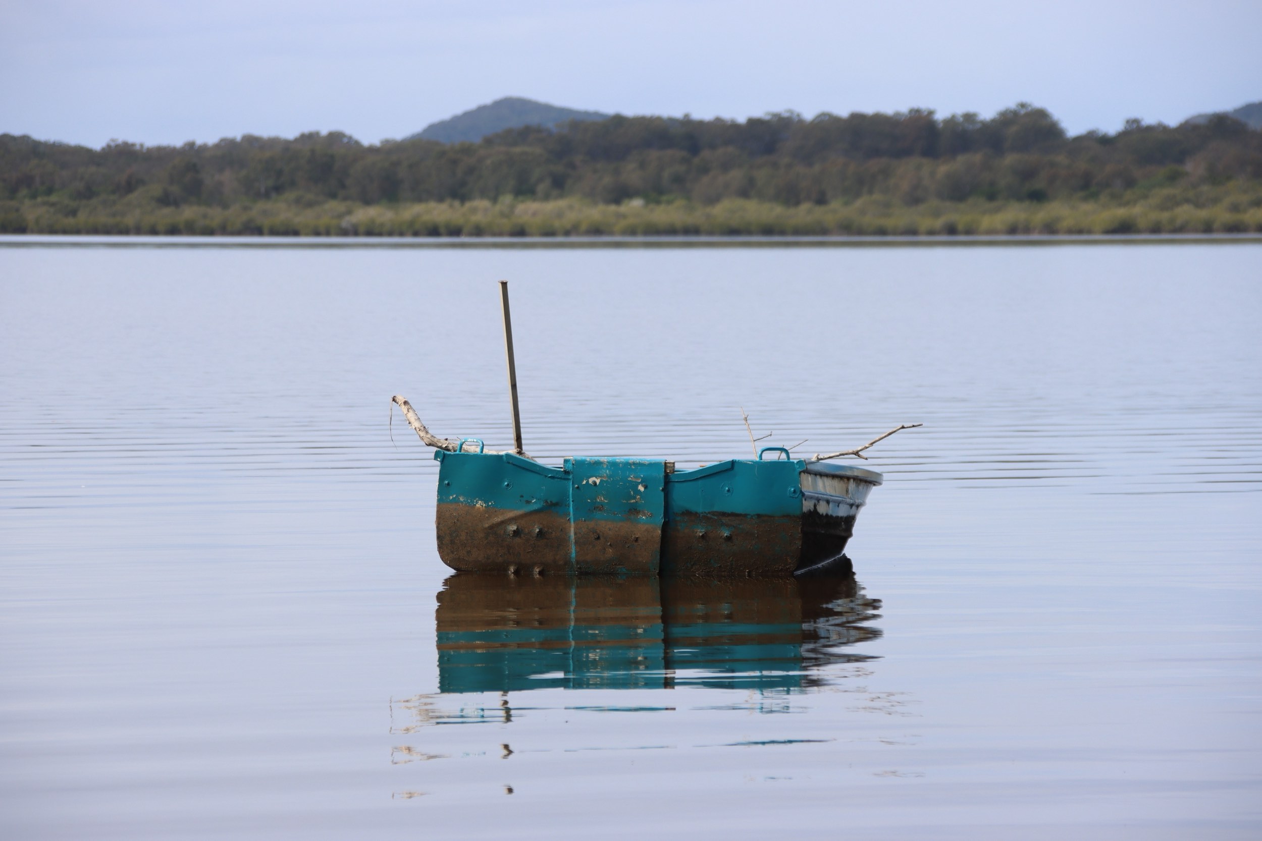 Small boat on Lake Cooroibah, Noosa, Queensland, Australia.