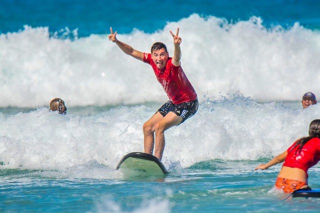 Person surfing in Noosa